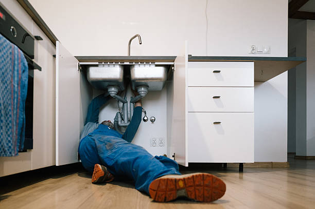 Professional Plumbing technician working in Sugar Valley, GA